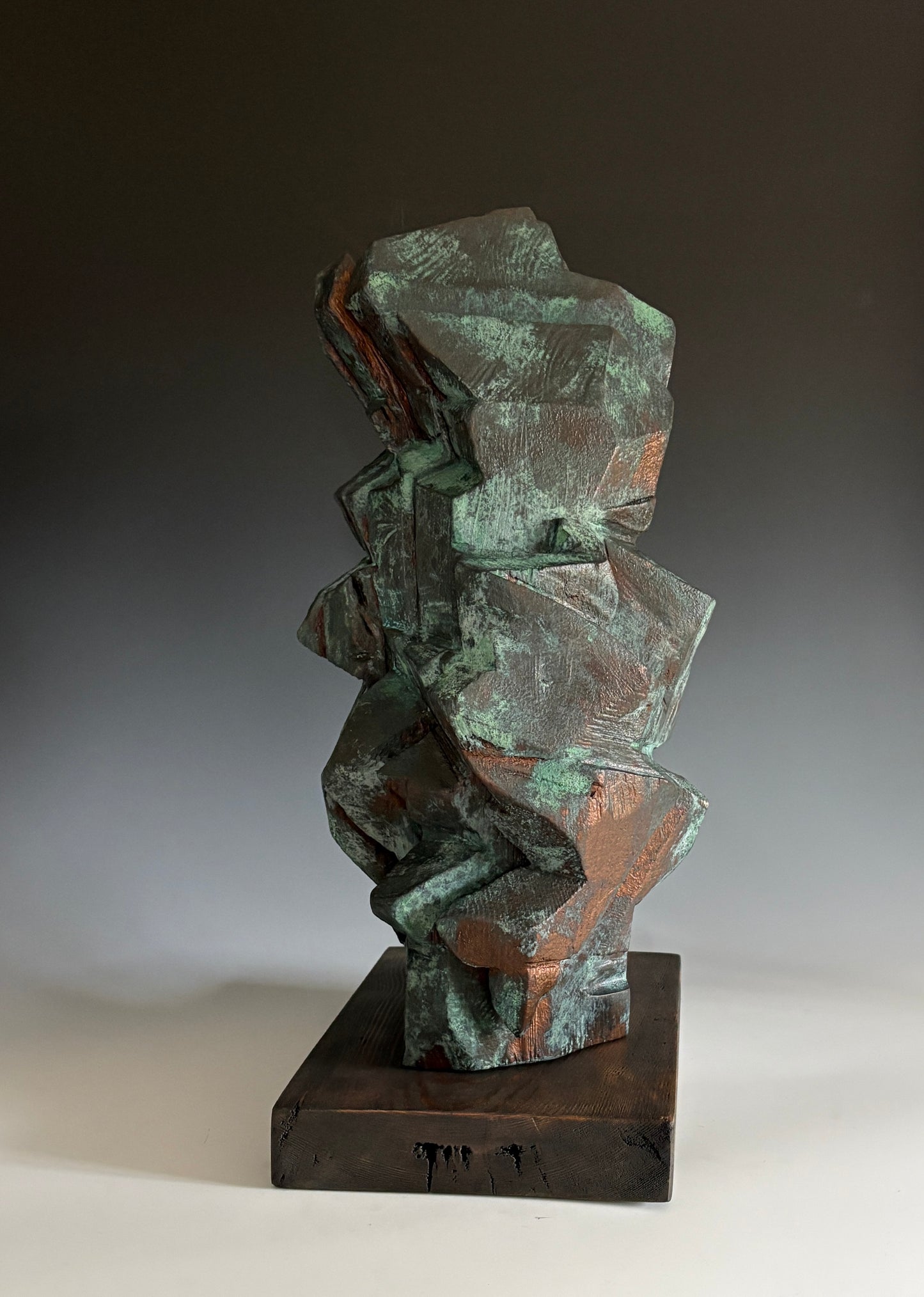 "SOLARA" HAND CARVED SPRUCE SCULPTURE WITH OXIDIZED BRONZE COATING
