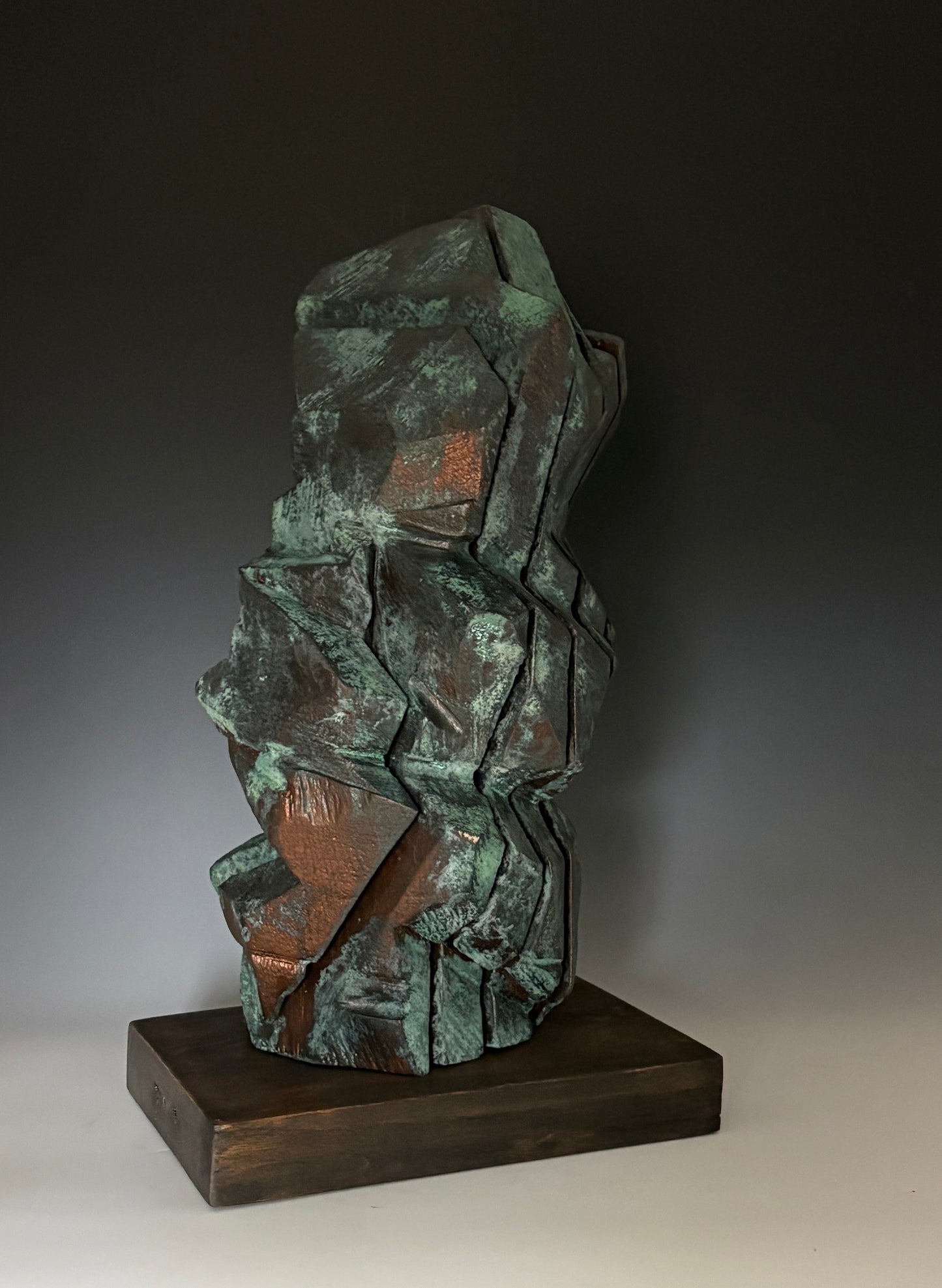 "SOLARA" HAND CARVED SPRUCE SCULPTURE WITH OXIDIZED BRONZE COATING