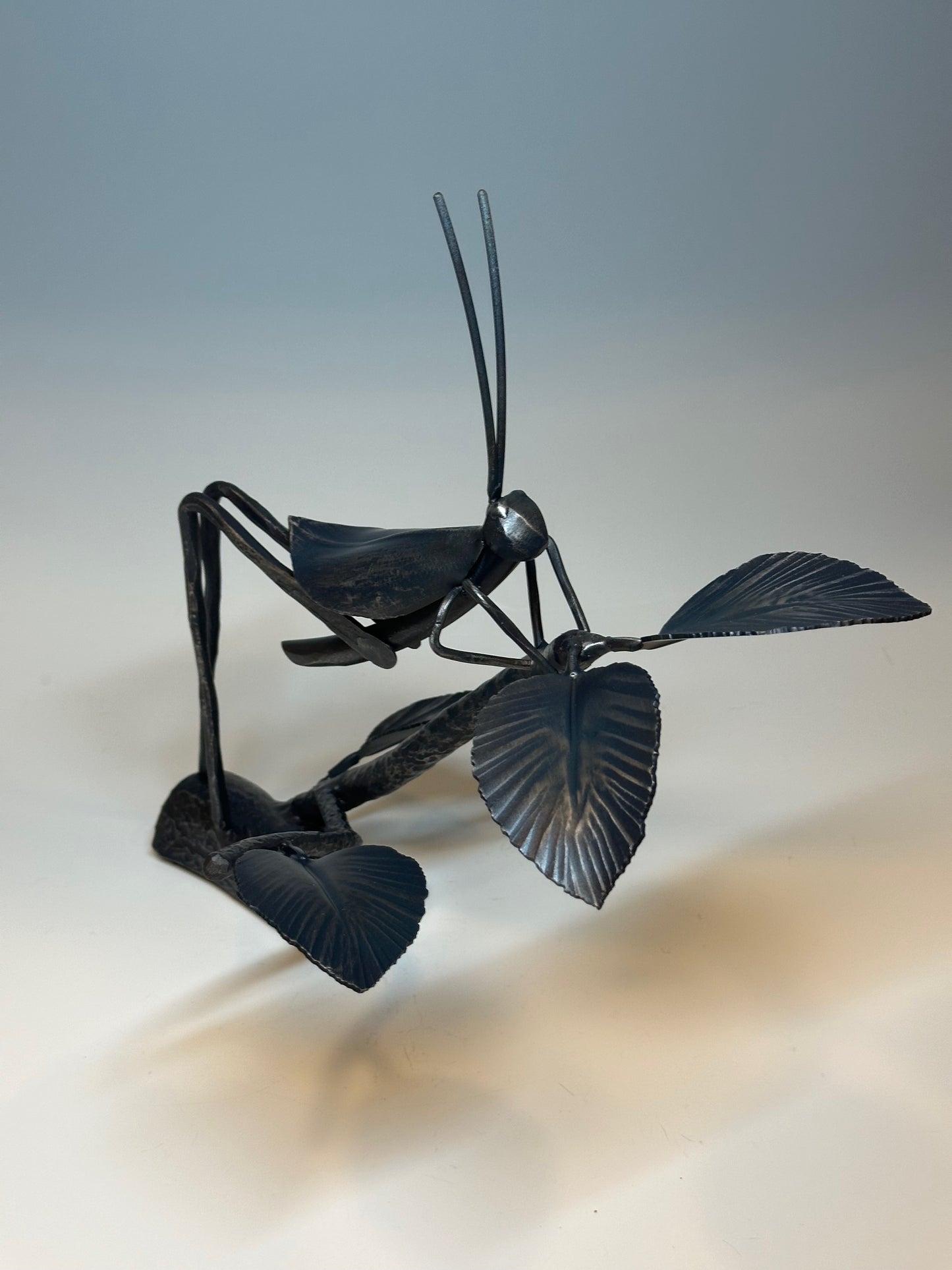 "CRICKET IV" HAND FORGED METAL SCULPTURE