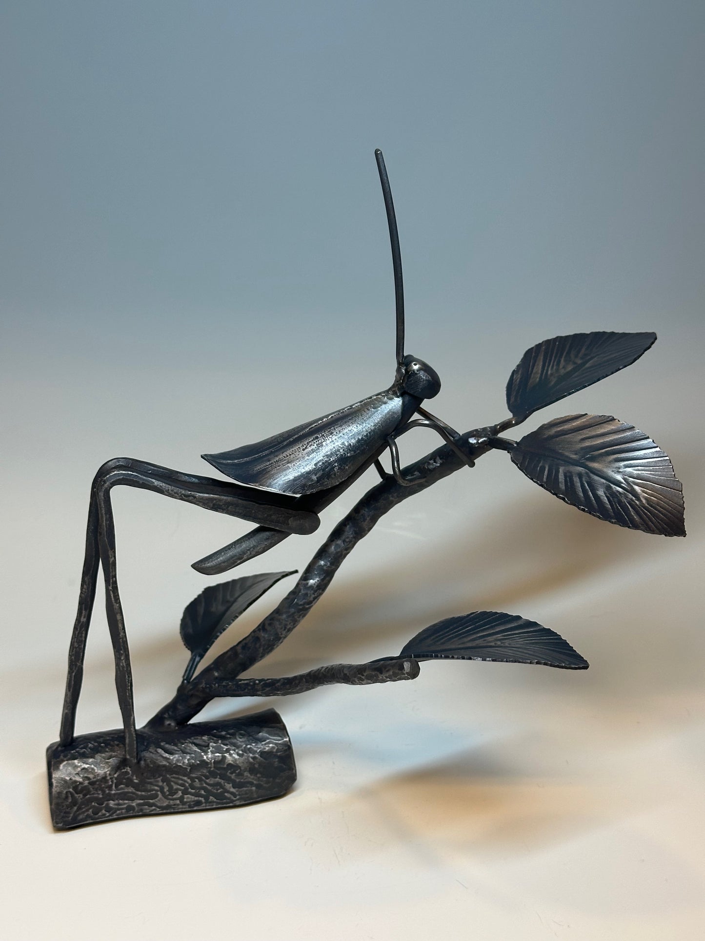 "CRICKET IV" HAND FORGED METAL SCULPTURE