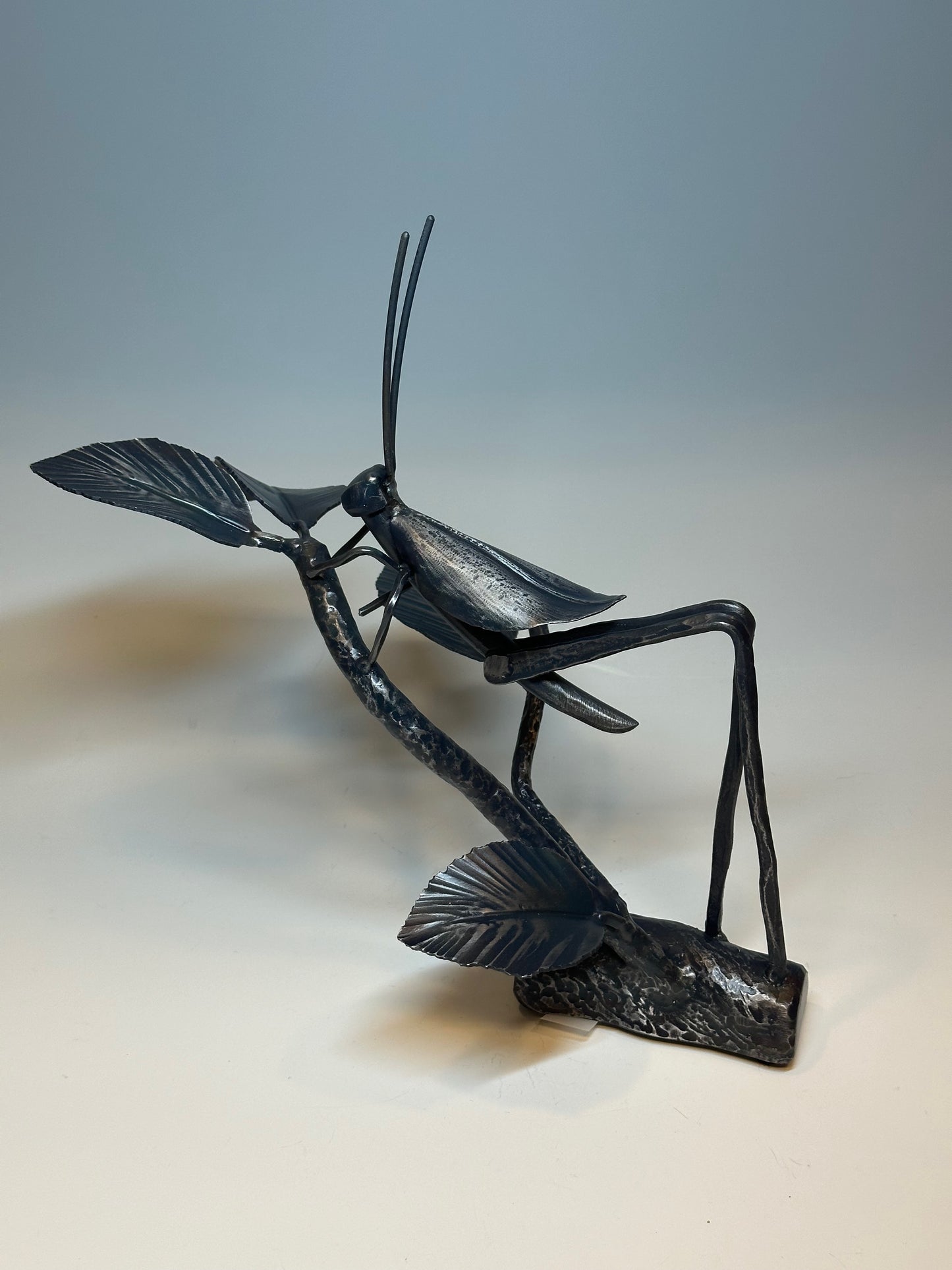 "CRICKET IV" HAND FORGED METAL SCULPTURE