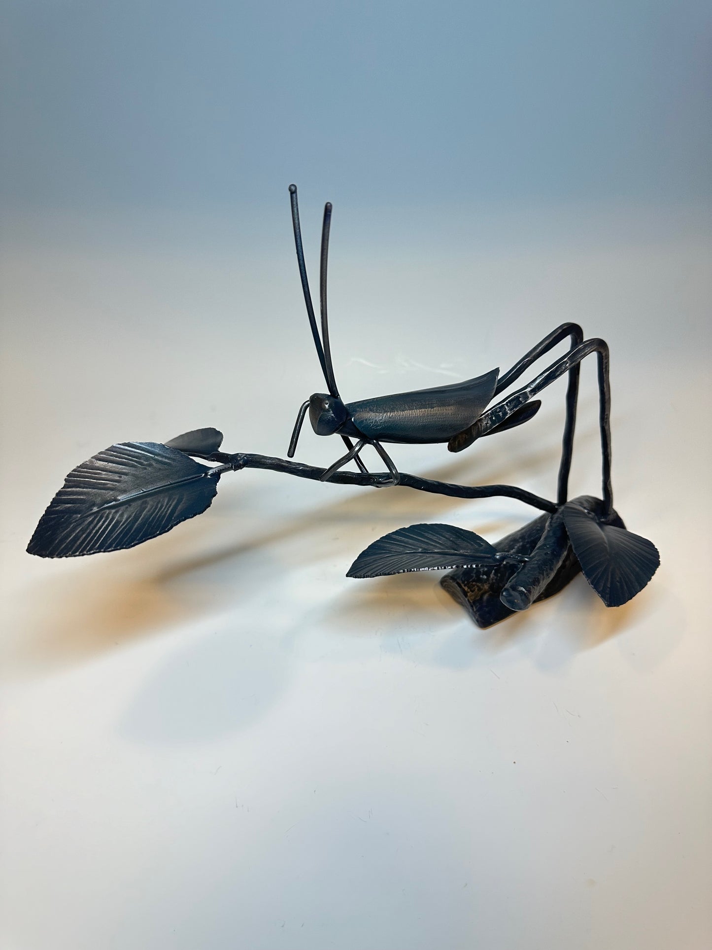 "CRICKET V" HAND FORGED METAL SCULPTURE