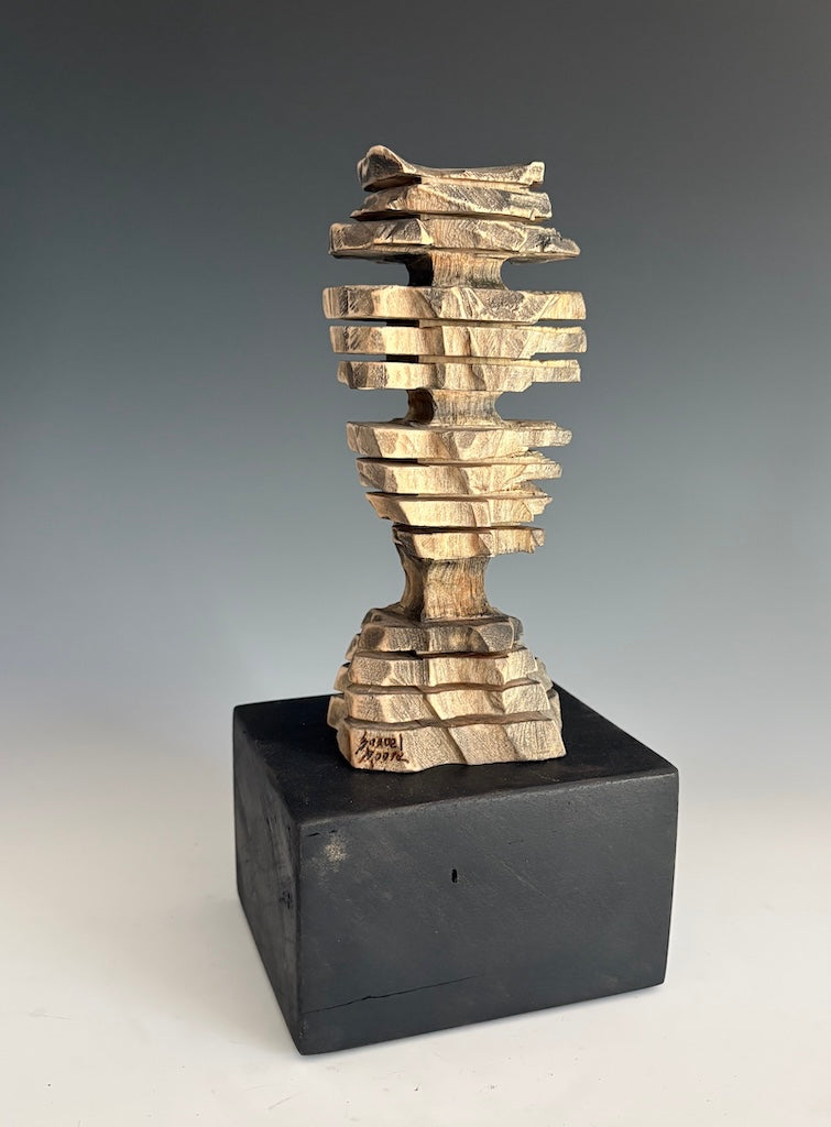 "VANISHING" HAND CARVED WHITE PINE WITH GRAPHITE SCULPTURE
