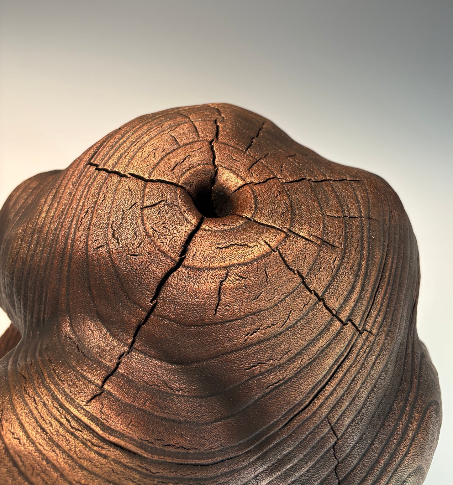 "WEEPING BUDDHA" HAND CARVED PAULOWNIA SCULPTURE