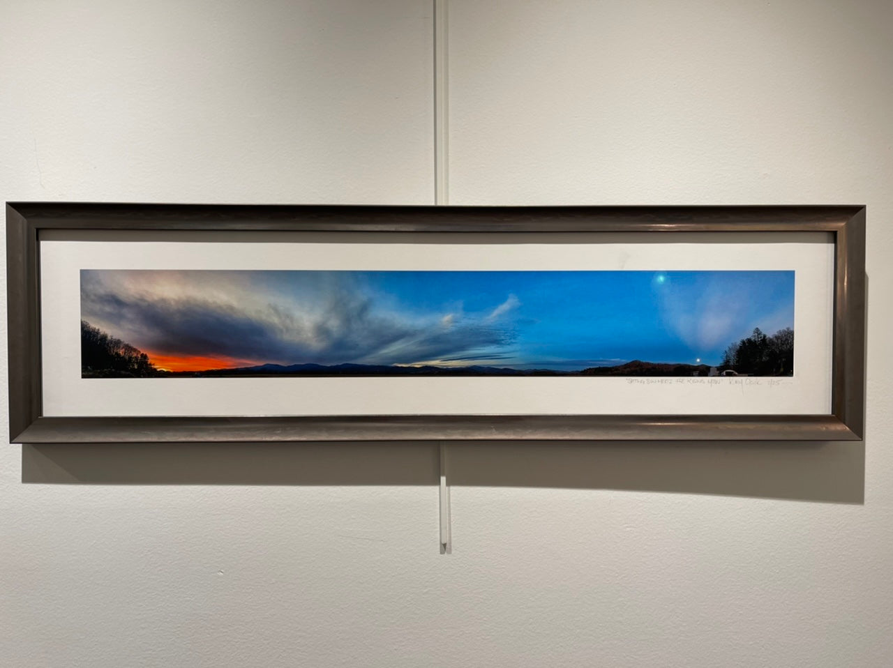 “The Setting of the Sun and Rise of the Moon” Panoramic Framed Photography