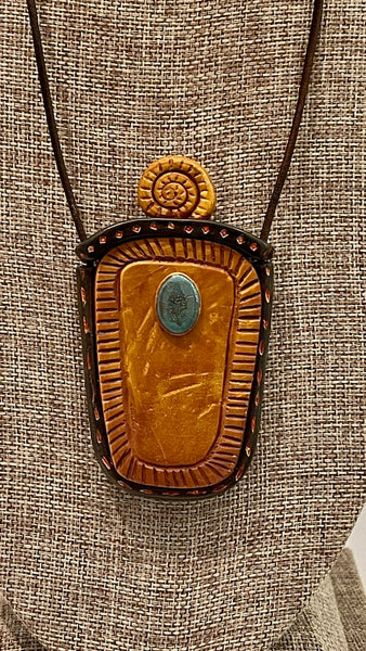 DOUBLE SIDED HAND CARVED POLYMER CLAY PENDANT PCN498